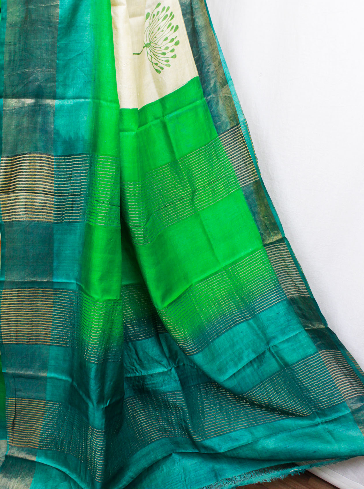 natural beige color-based with green block printed body with zari border, pallu and blouse piece, floral printed zari border tussar silk saree