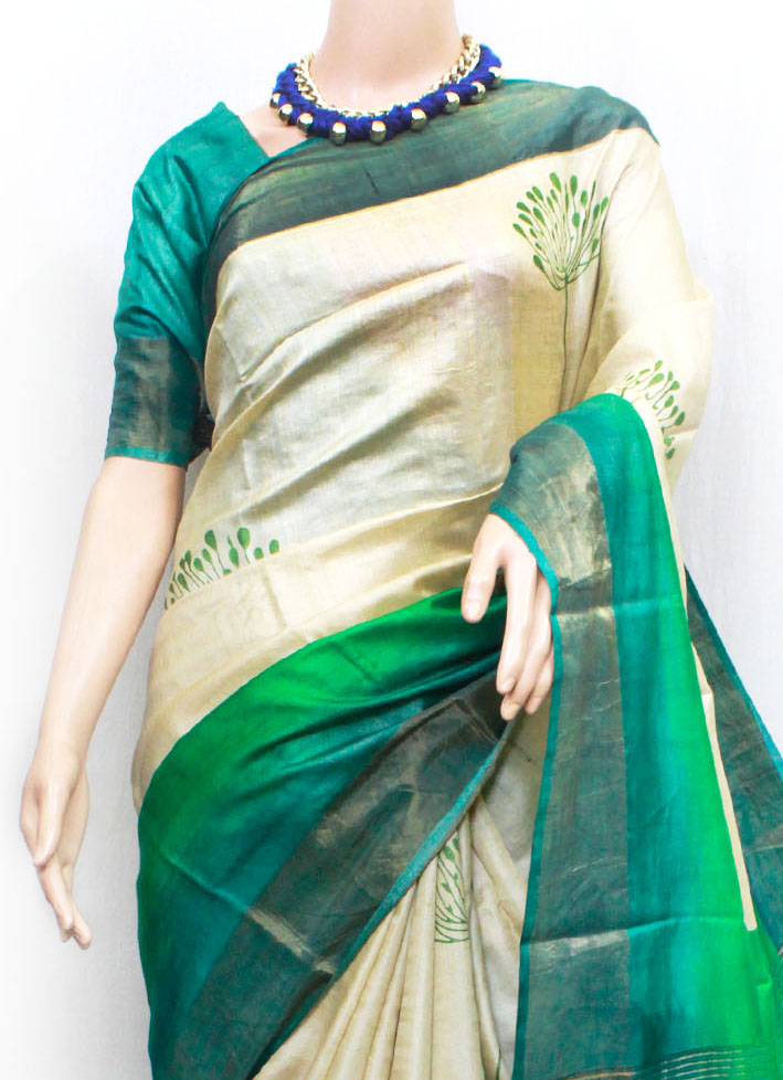 natural beige color-based with green block printed body with zari border, pallu and blouse piece, floral printed zari border tussar silk saree